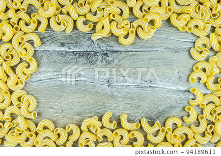 Cavatappi pasta background 94189611