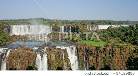 majestic Iguazu falls, in Brazil Argentina border. UNESCO World Heritage Site majestic Iguazu falls, in Brazil Argentina border. UNESCO World Heritage Site 94189896