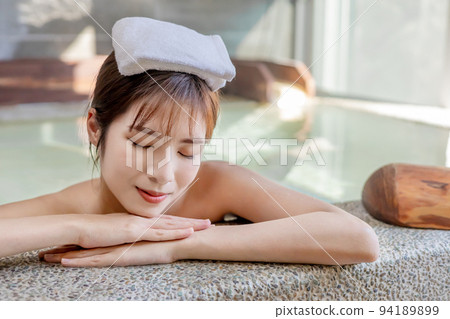 Woman with closed eyes resting Woman with closed eyes resting 94189899