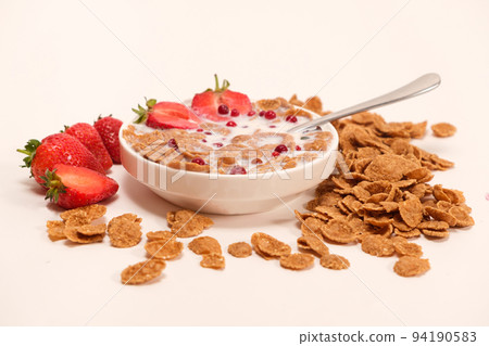 Cereals drenched in milk - quick breakfast with fruits and berries Cereals drenched in milk - quick breakfast with fruits and berries 94190583