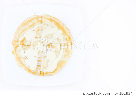 Pancakes drenched with condensed milk Pancakes drenched with condensed milk 94191934