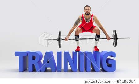 Young muscular athlete with barbell training over huge 3d lettering on white background. Sport, weightlifting, power, strength, ad concept. Collage 94193094