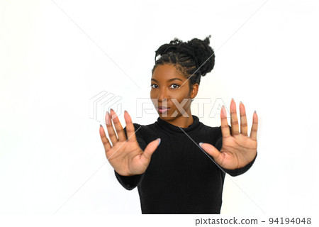 African American woman showing stopping signs African American woman showing stopping signs 94194048