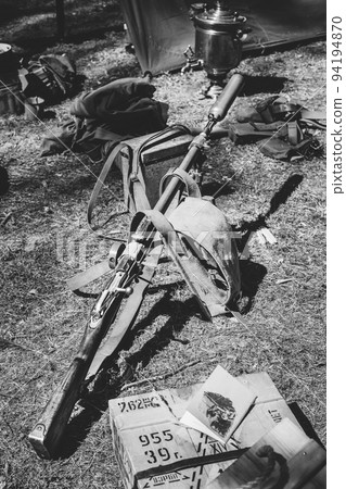 Old soviet russian rifle mosin nagant model 91 38. model 91 cossack receiver with m44 rear sight m 1944 stock and hand guard. rifle with 91 receiver and grenade launcher. Black And White Toned Shot Old soviet russian rifle mosin nagant model 91 38. model 91 cossack receiver with m44 rear sight m 1944 stock and hand guard. rifle with 91 receiver and grenade launcher. Black And White Toned Shot 94194870