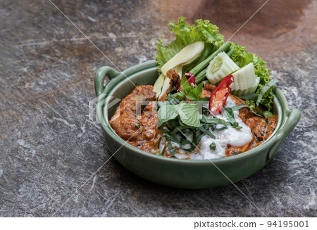 Traditional stir fried spicy Asian Redtail Catfish (Hemibagrus wyckioides) or Kang catfish with red curry paste. Traditional stir fried spicy Asian Redtail Catfish (Hemibagrus wyckioides) or Kang catfish with red curry paste. 94195001