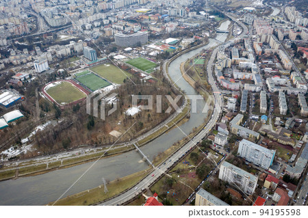 Aerial above view of river crossing the city Aerial above view of river crossing the city 94195598
