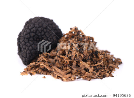 Black truffles isolated on a white background. Fresh sliced truffle. Delicacy exclusive truffle mushroom. Piquant and fragrant French delicacy. Clipping path. Black truffles isolated on a white background. Fresh sliced truffle. Delicacy exclusive truffle mushroom. Piquant and fragrant French delicacy. Clipping path. 94195686