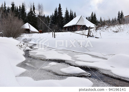 Mountain wooden chalet covered with fresh snow Mountain wooden chalet covered with fresh snow 94196141