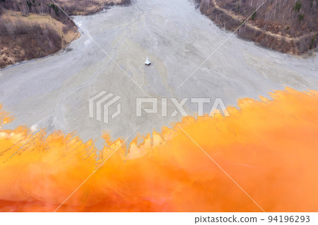 Aerial view of a submerged church in contaminated lake Aerial view of a submerged church in contaminated lake 94196293