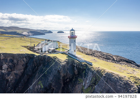Aerial view of the lighthouse on the island of Arranmore in County Donegal, Ireland 94197828