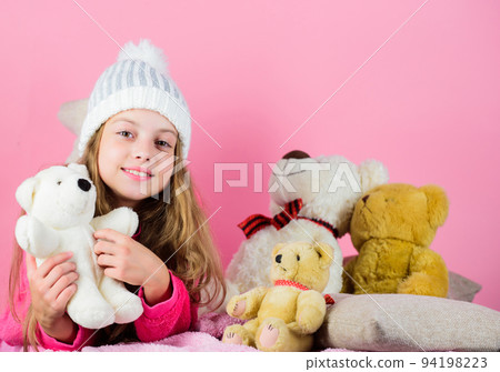 Bears toys collection. Child small girl playful hold teddy bear plush toy. Teddy bears help children handle emotions and limit stress. Kid little girl play with soft toy teddy bear on pink background Bears toys collection. Child small girl playful hold teddy bear plush toy. Teddy bears help children handle emotions and limit stress. Kid little girl play with soft toy teddy bear on pink background 94198223