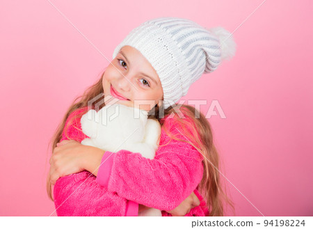 Kid cute girl play with soft toy teddy bear pink background. Child small girl playful hold teddy bear plush toy. Unique attachments to stuffed animals. Teddy bears improve psychological wellbeing Kid cute girl play with soft toy teddy bear pink background. Child small girl playful hold teddy bear plush toy. Unique attachments to stuffed animals. Teddy bears improve psychological wellbeing 94198224