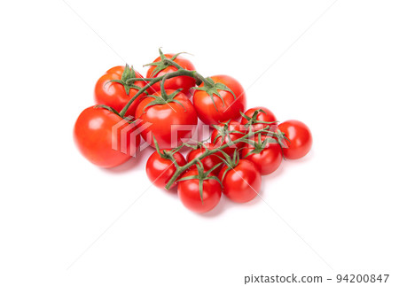 Fresh red cherry tomato clusters of different size isolated on white Fresh red cherry tomato clusters of different size isolated on white 94200847