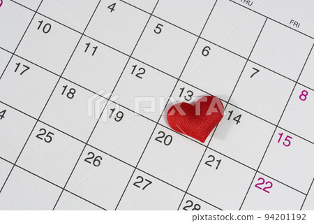 Red heart shape on the date of the 13th day in the calendar. Red heart shape on the date of the 13th day in the calendar. 94201192