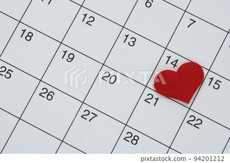 Red heart shape on the date of the 14th day in the calendar. Red heart shape on the date of the 14th day in the calendar. 94201212