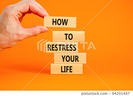 Restress your life symbol. Concept words How to restress your life on wooden blocks. Doctor hand. Beautiful orange background. Psychological business and restress your life concept. Copy space. Restress your life symbol. Concept words How to restress your life on wooden blocks. Doctor hand. Beautiful orange background. Psychological business and restress your life concept. Copy space. 94201487