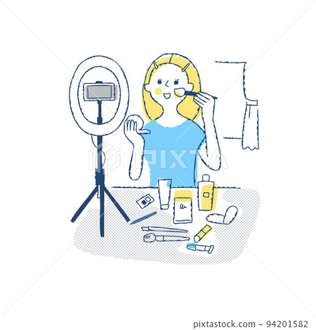 A woman shooting her own makeup video with a smartphone A woman shooting her own makeup video with a smartphone 94201582