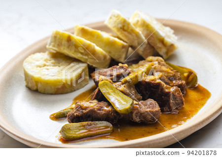 beef meat with picles sauce and dumplings 94201878