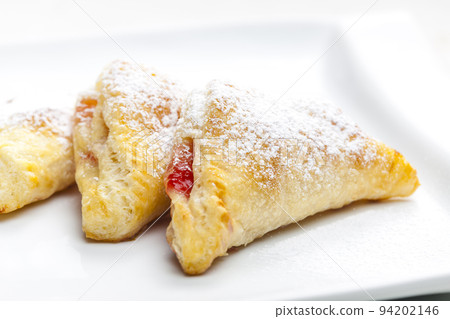 homemade puff pastry filled with strawberry jam 94202146