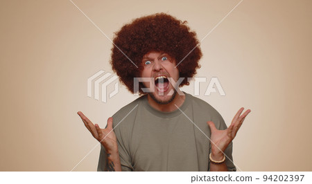 Man screams from stress tension problem feels horror hopelessness fear surprise shock expresses rage Man screams from stress tension problem feels horror hopelessness fear surprise shock expresses rage 94202397