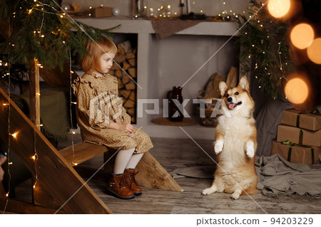 Girl sitting with dog Girl sitting with dog 94203229