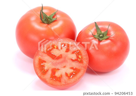 Medium size tomato cut cross section bright background 94206453