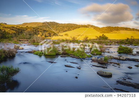 Southern Brazil countryside and river landscape at peaceful sunset 94207318