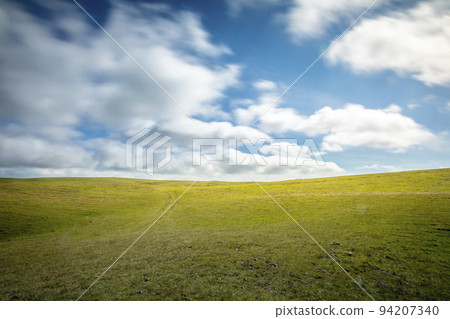 Blurred clouds motion and Rio Grande do Sul pampa - Southern Brazil Blurred clouds motion and Rio Grande do Sul pampa - Southern Brazil 94207340