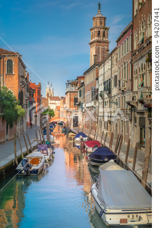 Peaceful Canal scenary in romantic Venice at springtime, Italy 94207441