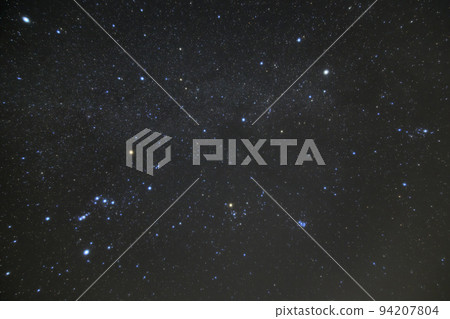Starfield photo around the winter constellation Orion 94207804
