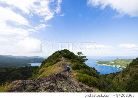 Children hiking on Ogasawara Chichijima Children hiking on Ogasawara Chichijima 94208365