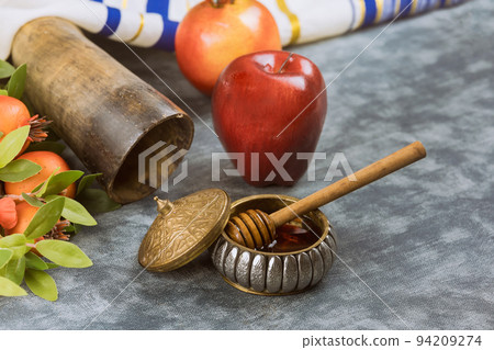 There are a number of traditional Jewish New Year symbols associated with Rosh Hashanah, such as apples, honey, and pomegranates There are a number of traditional Jewish New Year symbols associated with Rosh Hashanah, such as apples, honey, and pomegranates 94209274