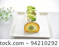 Shine Muscat roll cake taken in bright natural light Horizontal position White background 94210292