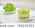 Piece of Shine Muscat no-bake cheesecake taken in bright natural light Horizontal position White background 94210301