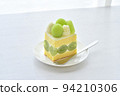 Piece of Shine Muscat shortcake taken in bright natural light Horizontal position White background 94210306