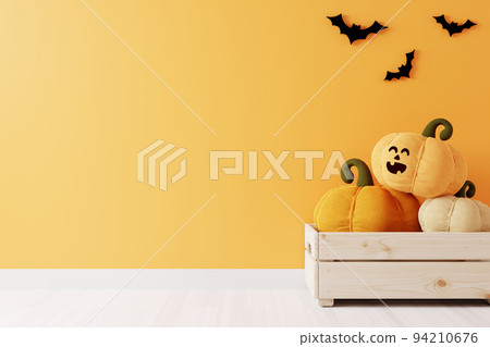 Orange background with smiling pumpkin in basket and bats for Halloween. 94210676