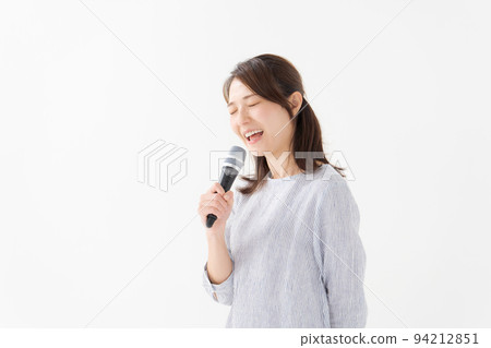 A woman with a microphone A woman with a microphone 94212851