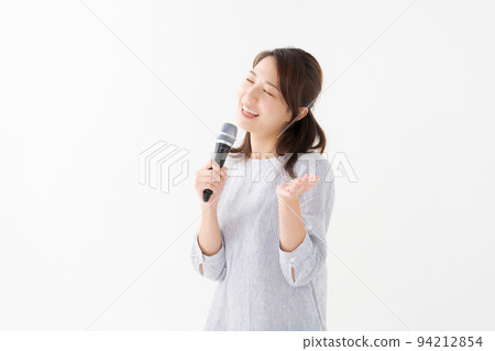 A woman with a microphone A woman with a microphone 94212854