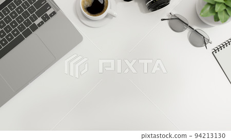 Modern minimal white working table with laptop, decor and copy space. top view. 94213130