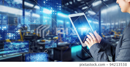 An engineer who operates a factory machine with a tablet Factory Automation An engineer who operates a factory machine with a tablet Factory Automation 94213538