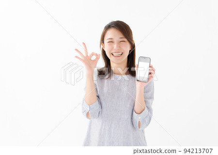 Woman holding a smartphone 94213707