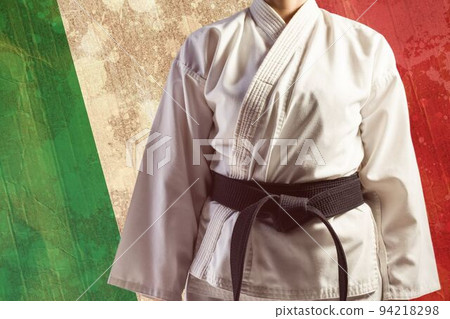 Midsection of martial artist against Italian Flag 94218298
