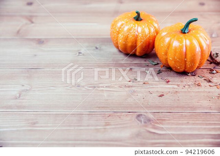 High angle view of two pumpkins on table High angle view of two pumpkins on table 94219606