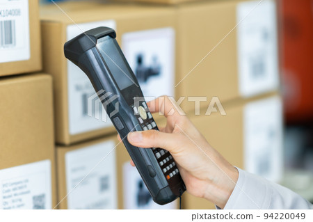 Staff reading barcodes on terminals Faceless 94220049
