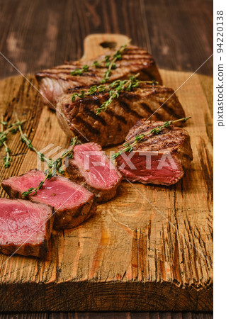 Grilled beef steak cut on slices Grilled beef steak cut on slices 94220138