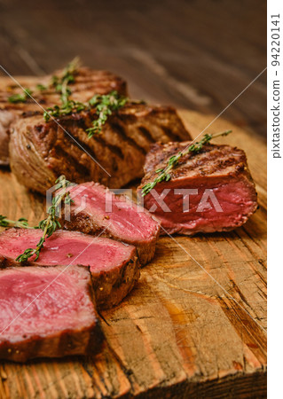 Closeup view of medium rare beef steak Closeup view of medium rare beef steak 94220141
