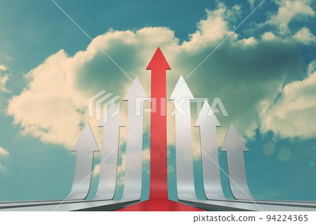 Red and grey arrows pointing up against sky 94224365