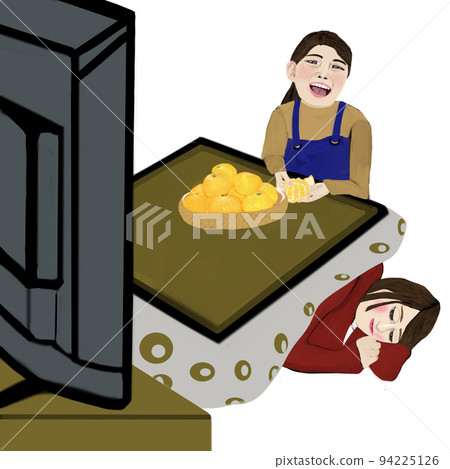 woman watching tv on kotatsu 94225126