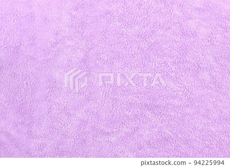 Flat lay of purple fluffy towel fabric texture. Blank and soft bathroom carpet surface. Flat lay of purple fluffy towel fabric texture. Blank and soft bathroom carpet surface. 94225994