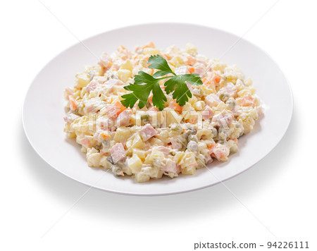 plate of russian salad olivier on white background plate of russian salad olivier on white background 94226111